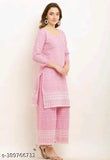Pink cotton blend kurta & plazzo set for women, three-quarter sleeves, vibrant pink color, Indian ethnic wear on model