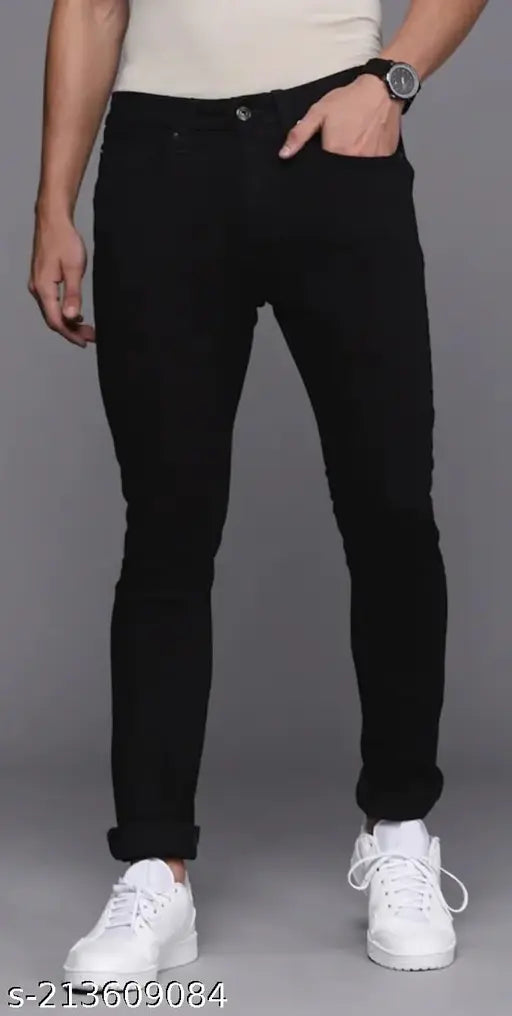 Black men's cotton lycra jeans, denim solid style on model, size 32 (waist 32in, length 41in, hip 38in) - made in India