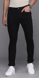 Black men's cotton lycra jeans, denim solid style on model, size 32 (waist 32in, length 41in, hip 38in) - made in India