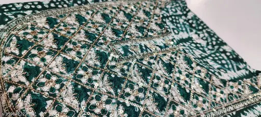 Green printed rayon kurti with three-quarter sleeves, embroidery work, and chevron print. Comfortable fabric for various occasions. Dress made from finest quality, wine color Jaipuri print