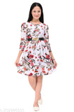 White printed flower knee-length kid's party dress with belt, ideal for every occasion. Soft crepe fabric, short sleeves, and floral pattern. Perfect for girls who love flowers