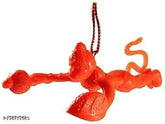 Orange plastic Hanuman idol car decoration: Flying Lord Hanuman Bajrang Bali figurine, 1.5x1.5x1.5 inches, made in India