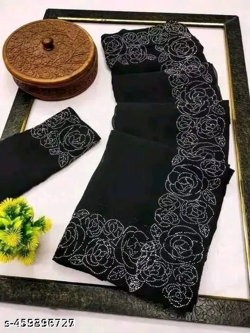 Black Georgette saree with Siroski stone cut broder work, elegant Indian traditional wear on mannequin
