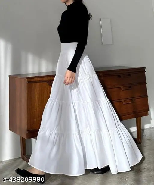 White rayon skirt for women and girls, attractive and stylish with solid net pattern. Women's size 26 (waist 26in, hip 30in, length 38in), also available in sizes 28, 30, 32, 34, 36, 38, 40, 42, 44. Made in India
