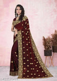 Maroon Georgette saree with heavy border embellishments, perfect for Diwali, Karwa Chauth, weddings, anniversaries, and celebrations