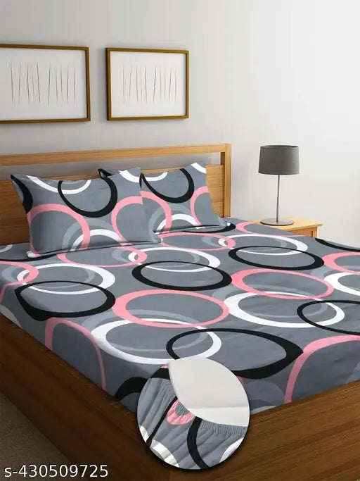 Grey multi-colored glace cotton fitted bedsheet with two large pillow covers, ideal for a King Size Double bed up to 8 inches thick. Breathable, soft, and easy to wash at home
