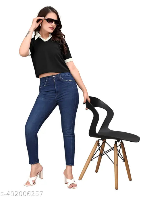 Black Lycra women's crop collar t-shirt, solid design in multiple sizes (S-XL) on hangar