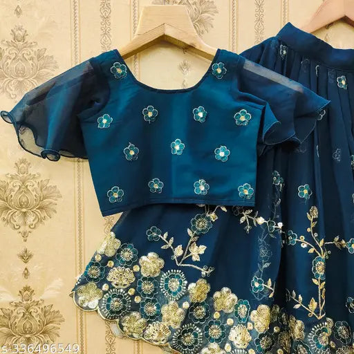 Georgette embroidered work lehenga choli for girls aged 2-8 years, Indian traditional attire on display