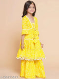 Girls yellow full printed Sarara Set, rayon Anarkali palazzos with three-quarter sleeves | Indian girls clothing set on display