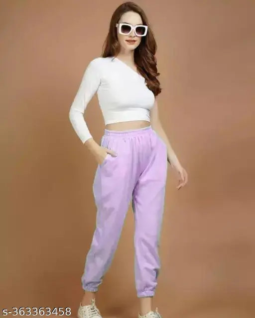 Women's fleece jogger pants, deep side pockets, elastic waistband, solid color, perfect for sports & gym