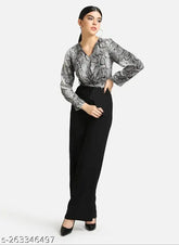 Fancy printed net Lycra jumpsuit for women, long sleeves, India-made fashionwear on mannequin