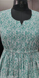 Green cotton blend calf-length fit-and-flare dress, three-quarter sleeves, printed pattern on Indian background