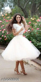 Niyra women's solid net tullu skirt, stylish and fancy, free size with waist 32in, length 28in, hip 40in. Handcrafted Indian ethnic wear