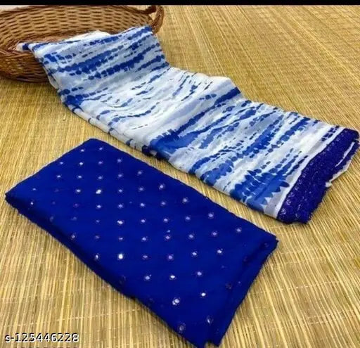 Georgette dyed/washed saree with embellished net unstitched blouse, perfect for parties and special occasions. Single size, free-size saree length 5.5m, blouse length 0.8m. Indian origin