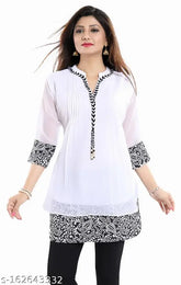 White/Black printed georgette kurta with three-quarter sleeves and a self-designed pattern. Meher Impex women's fashion on display