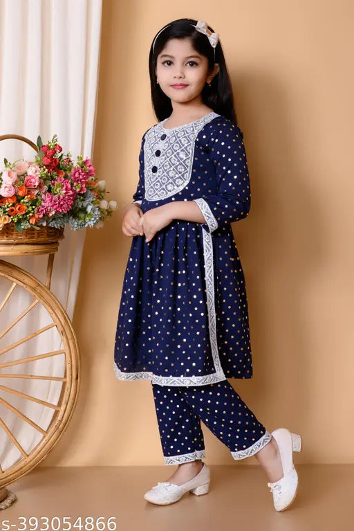 Multicolor cotton party dress combo for kids (ages 1-10), featuring blue, red, and purple designs. High-quality A-line frock with three-quarter sleeves and matching pyjama bottoms. Soft pure cotton fabric, durable stitching, and vibrant printing. Ideal for children's parties and events