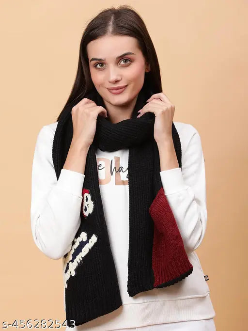 Black wool knitted muffler with embroidered patches, stylish women's accessory for layering and warmth