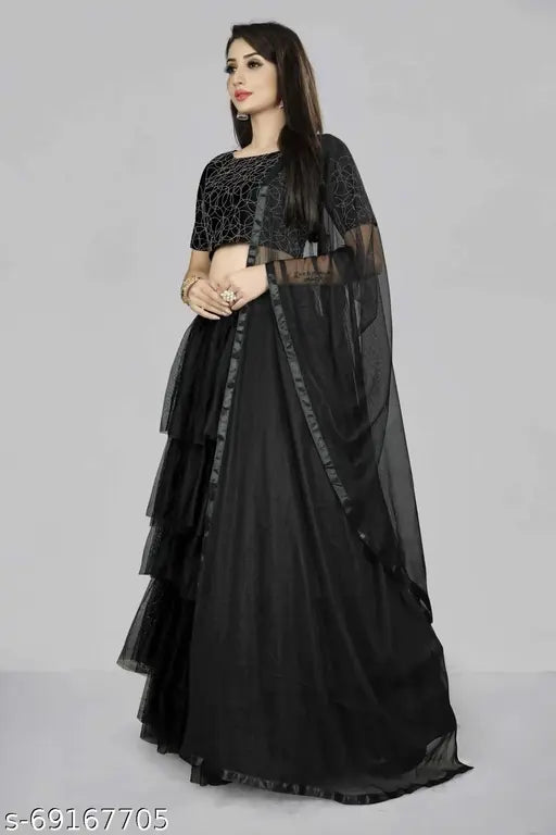 Black embroidered semi-stitched Lehenga Choli on mannequin with net dupatta, satin choli and ruffled bottom