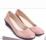 Stylish pink and black patent leather ballerinas by Hagam - women's ballet flats with closed back and lightweight sole for comfortable walking and modern style statement