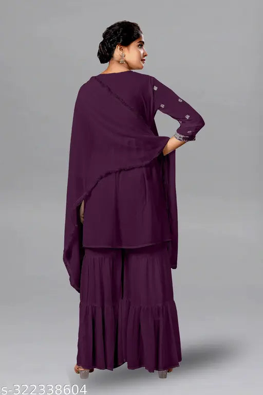 Embroidered Georgette Kurta & Sharara Set with sequins, three-quarter sleeves, and matching dupatta. Indian embroidered clothing on mannequin