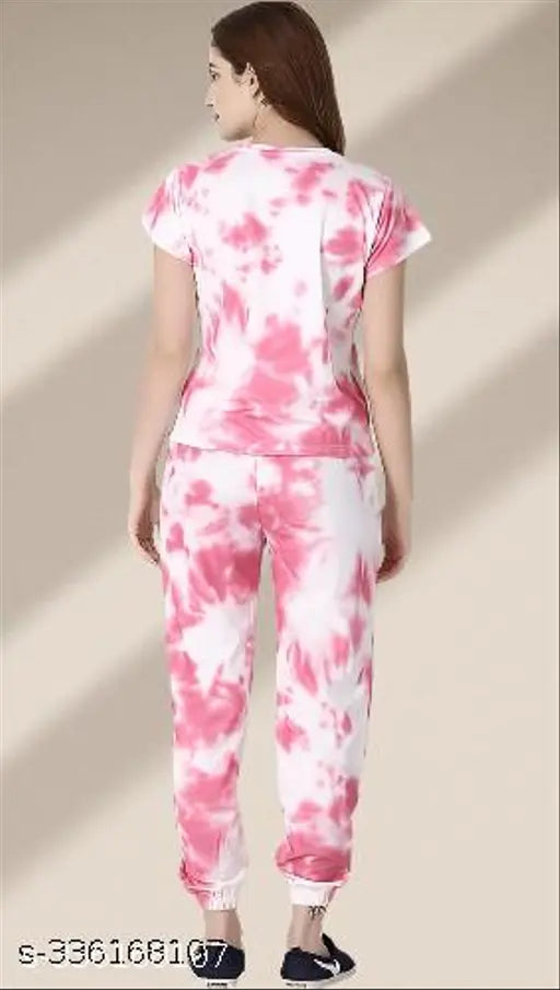 Exclusive pink polyester nightsuit set with short sleeves, dyed/washed net pattern. Freshbook attractive women's sleepwear in sizes XS-XXL, originating from India