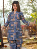 Indian hand-printed women's kurta and trousers set, featuring beautiful coordinating colors and patterns, ideal for western wear