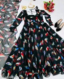 Designer Georgette gown with organza dupatta, printed net, three-quarter sleeves. Indian bridal wear on mannequin