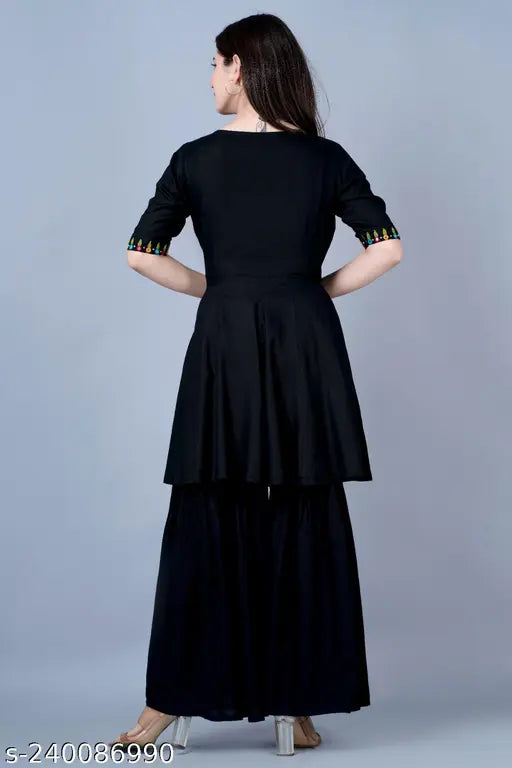 Black rayon kurta set with tassels, solid design from India