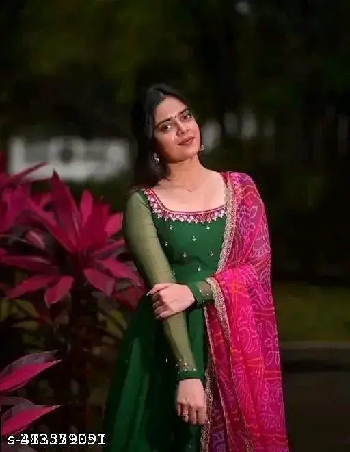 Green embellished Georgette maxi dress with mirror work and stone detail, paired with a digital print dupatta featuring lace, suitable for casual wear in sizes S-XXL