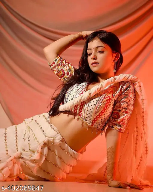 White Georgette embroidered sequin saree with banarasi silk blouse piece, zari woven pattern on display