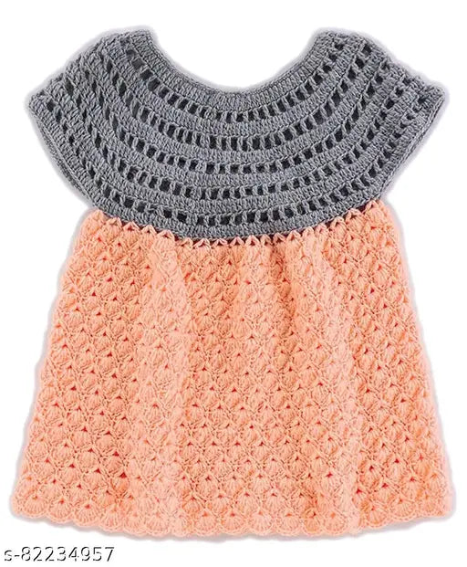 Orange woolen boat neck frock for baby girl - handmade by Love, embellished multipack of 1 with matching cap and shoes. Handknit wool fabric, sleeveless design. Available in sizes: 0-3M (11in bust, 12in length, 10in waist), 3-6M (11in bust, 13in length, 10in waist), 6-9M (11in bust, 14in length, 10in waist), 9-12M (12in bust, 15in length, 11in waist), 12-18M (12in bust, 16in length, 11in waist), 18-24M (12in bust, 17in length, 11in waist). Made in India