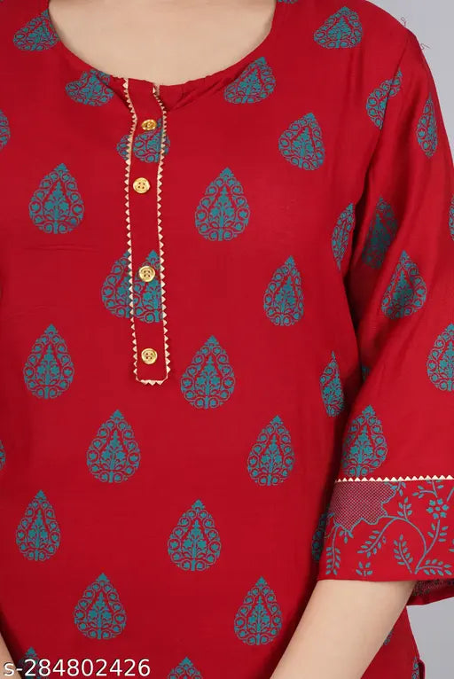 Women's rayon printed A-line kurta and palazzo set, perfect for ethnic wear in professional settings or special occasions. Made in India