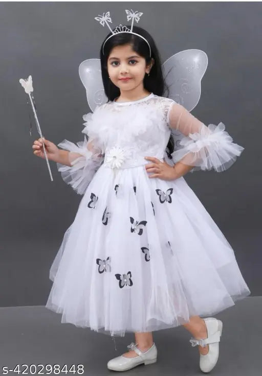 White net fit & flare party dress for girls, embellished with bell sleeves, hair band, fairy wings, and fairy stick. High-quality net fabric, comfortable for all-day wear. Perfect for transforming any celebration into a fairy-tale extravaganza. Country of Origin: India. (119 characters)