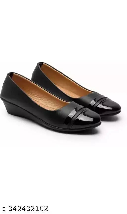 Black synthetic ballerinas with slip-on design, perfect for all ages and occasions. Made for comfortable style in various sizes (IND-3 to IND-8). Origin: India