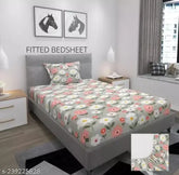 Grey cotton elastic fitted single bedsheet with breathable fabric, includes king size pillow cover. Soft floral printed design for summer comfort. Made in India