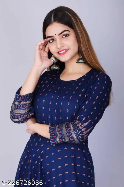 Blue rayon embroidered kurti with three-quarter sleeves and printed pattern, ideal for Indian summer fashion