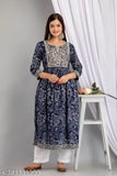 Blue embroidered rayon kurta set with cotton pants, intricate naira cut design on display