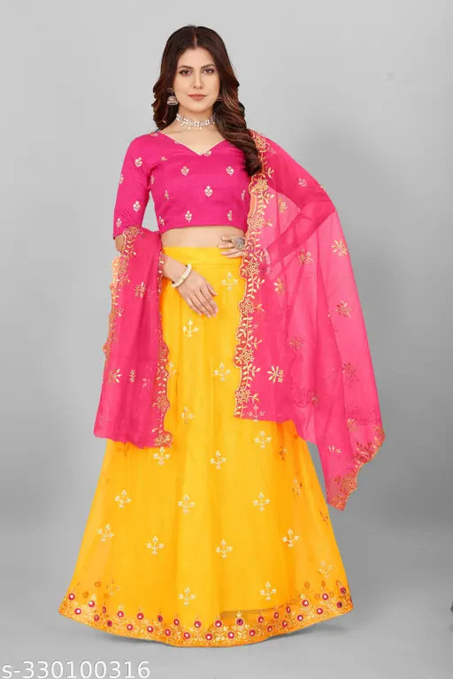 Heavy net fabric with multi-thread embroidery and mirror work Lehenga with embellished blouse. Indian handcrafted traditional wear featuring intricate broderie anglaise, real mirror work, and semi-stitch cut work
