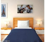 Soft & warm ac fleece blankets for single bed (58x88 inches), pack of 2. High-quality, lightweight, and plush, perfect for bedroom or living room use all year round. Red & blue color, multi-purpose for indoor lounging, camping, or air-conditioned rooms. Made in India, 100% polyester polar fleece with brushed fabric for softness and durability