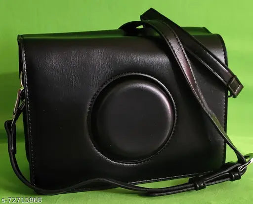 Black synthetic slingbag with adjustable shoulder strap and flap closure. One compartment self-designed net bag, free size. Handheld image