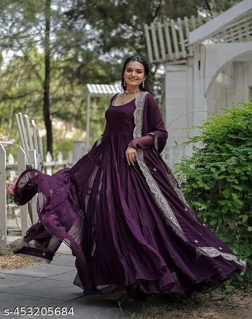 Purple embellished Anarkali dress in Georgette, long sleeves, solid design. Elegant formal gown for women's evening wear, suitable for parties, bridal or wedding events. Available in S, M, L, XL, XXL sizes online