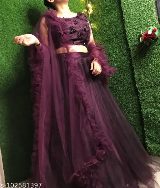 New, pink embellished acrylic-net lehenga choli with ruffled dupatta, ideal for parties and events. Indian designer ethnic wear