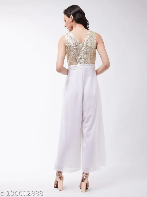 White polyester solid round neck jumpsuit by Miss Chase, off-white color, sleeveless with zip closure and side pockets
