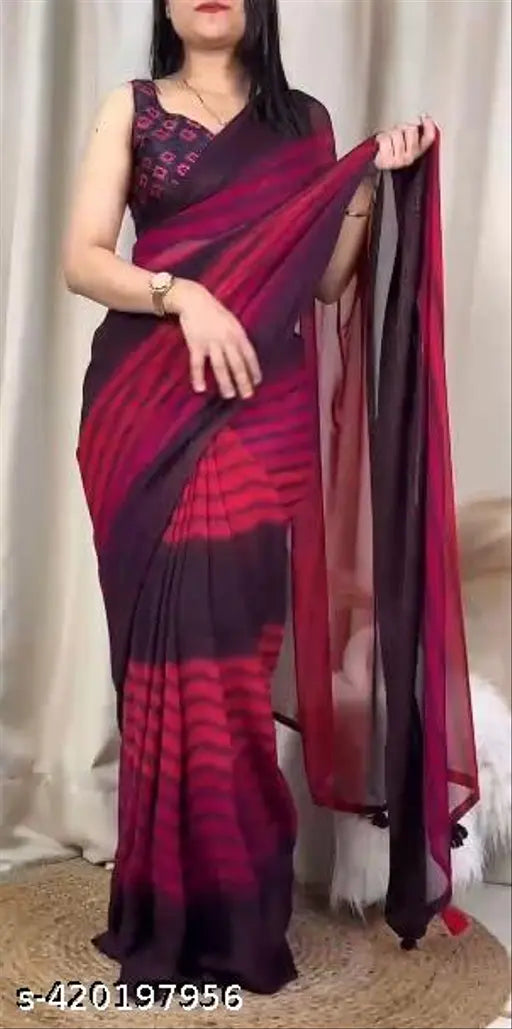Women's Georgette saree with satin blouse, spray print & tassels, India-made, vibrant summer wardrobe addition