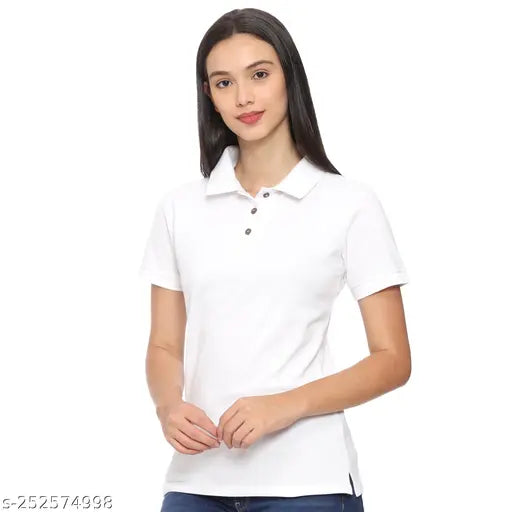White women's pique cotton polo half-sleeve shirt, office casual for women on clothing rack