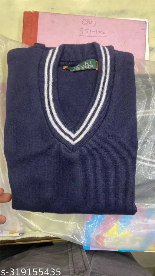 Navy white wool sweater, solid pattern for kids 3-14 years, on model wearing long sleeves