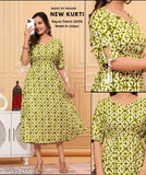 Green Printed Anarkali Kurti, Rayon fabric, three-quarter sleeves. Vibrant design, exquisite craftsmanship. Boat neck collar. Made in India