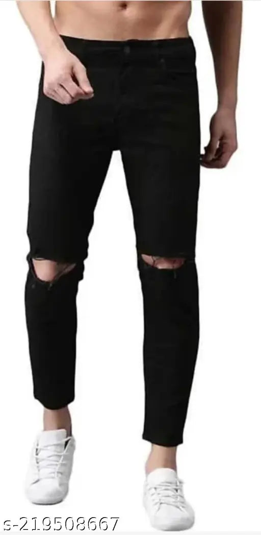 Men's black cotton blend knee slit jeans with multiple sizes available: 28, 30, 32, 34, 36. Indian-made fashion for men on a display stand
