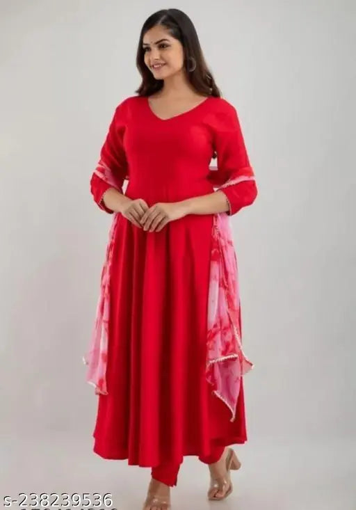Red rayon Anarkali kurta with attached dupatta, elegant festive wear in solid red, flattering silhouette and high-quality fabric