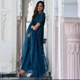 Gold-printed rayon kurta set with chiffon sharara dupatta and bottomwear, three-quarter sleeves. Indian women's fashion attire on mannequin